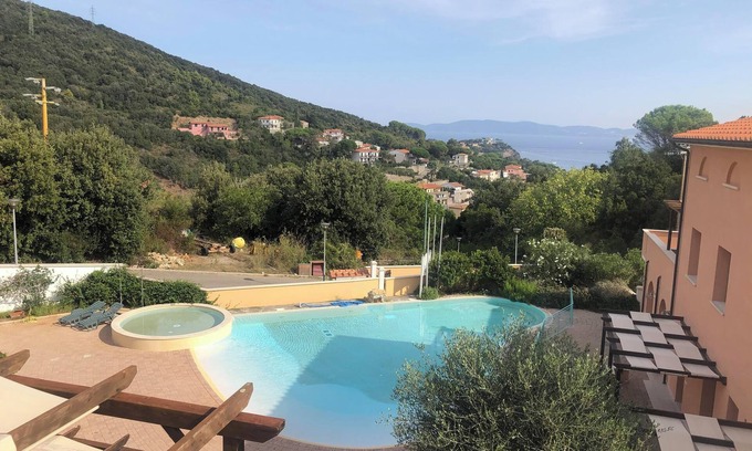 Cavo Apartment | Pet-friendly Vacation Apartment La Pergola al Cavo 107 with Mountain View, Pool & Terrace