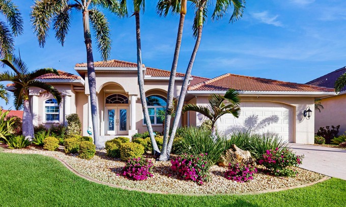 Burnt Store Isles House | Pet friendly, waterfront house with private pool, lanai, and arcade games