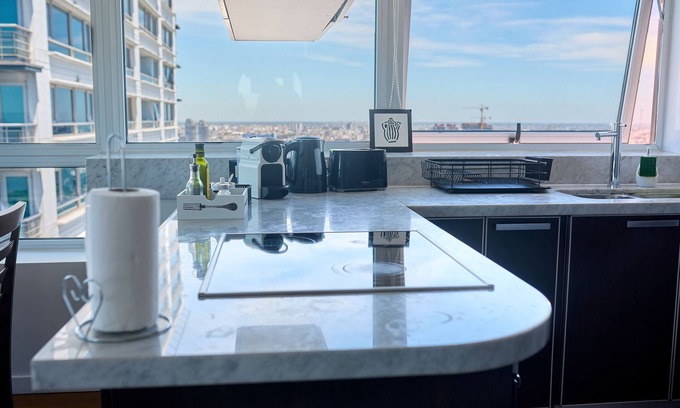 Buenos Aires Central Business District Apartment | PISO 41 VISTA AL RIO Y CIUDAD PTO MADERO