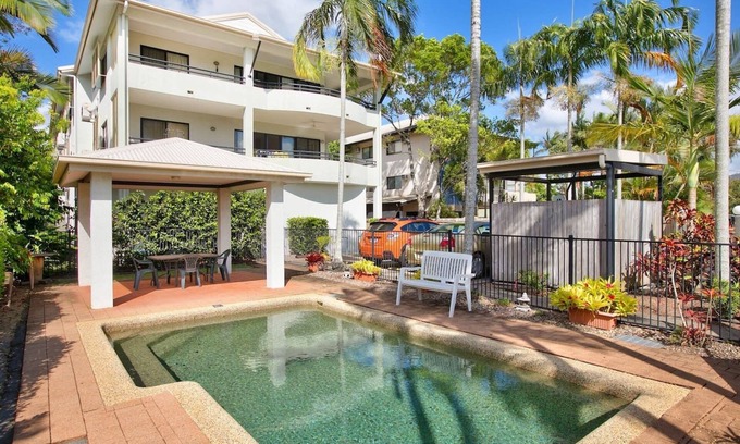 Manunda Apartment | Poolside Living in Contemporary Tropical Retreat