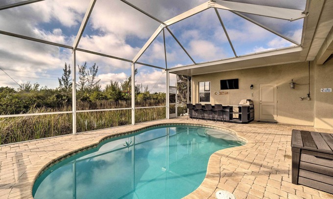 South Gulf Cove House | Port Charlotte Canalfront Home w/Pool & Dry Bar!