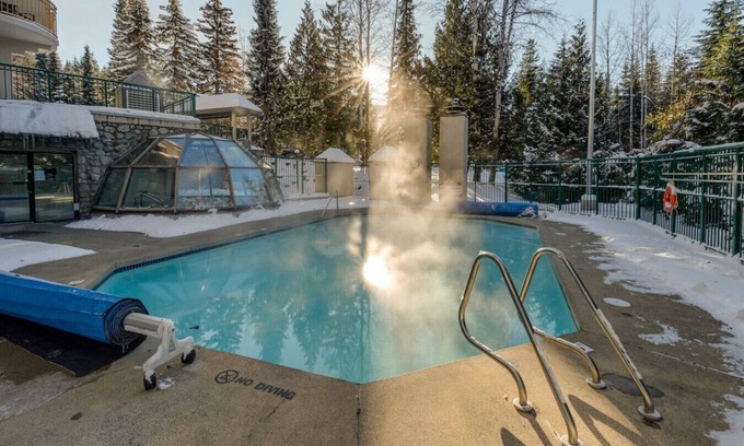Blackcomb Apartment | Prime Ski-in/out 2BR - Pool, HT, Sauna, EV Charger