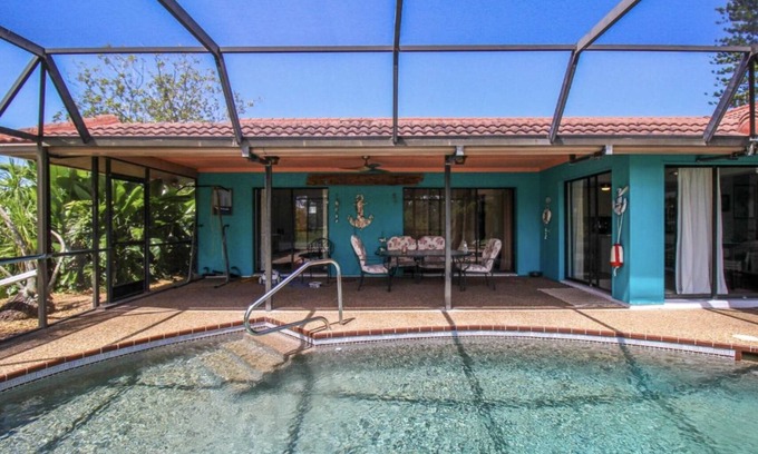Englewood House | Private 3 bed heated pool home within 10 minutes to the beach and restaurants.
