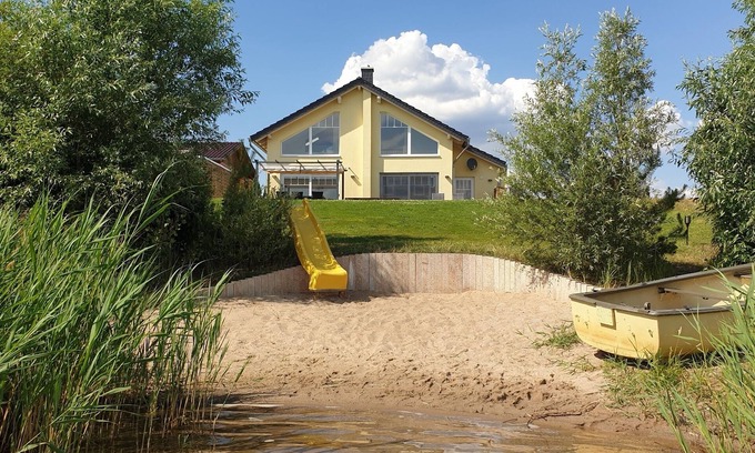 Lobnitz House | Private beach! NEW villa "Cloudless" with fireplace and sauna right on the beach
