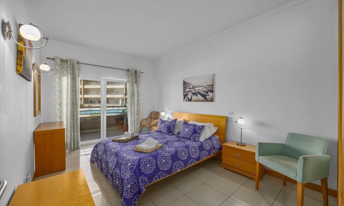 Areias de Sao Joao Apartment | Private Location Beach Apartment with Pool and Town Views in Quinta da Barracuda