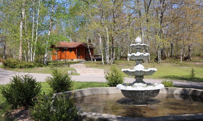 Presque Isle Cottage | Private log cabin with view overlooking Grand Lake