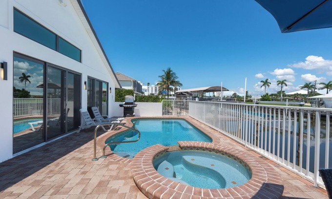South Island House | ☀️Private Pool | Canal Front with Boat Dock | Seas The Day☀️