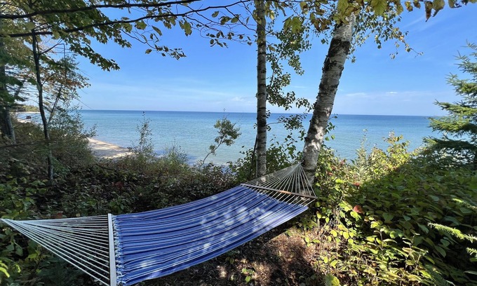 Cheboygan Cottage | Private & secluded beach front on Lake Huron!