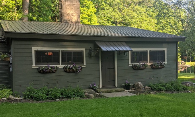 Wooster Cabin | Quaint Newly Remodeled Cabin with Stone Fireplace - Private Hot Tub - King Bed
