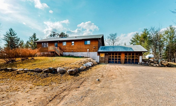 Lac du Flambeau House | Quiet lakefront home with dock, canoe, & sunroom - dog-friendly