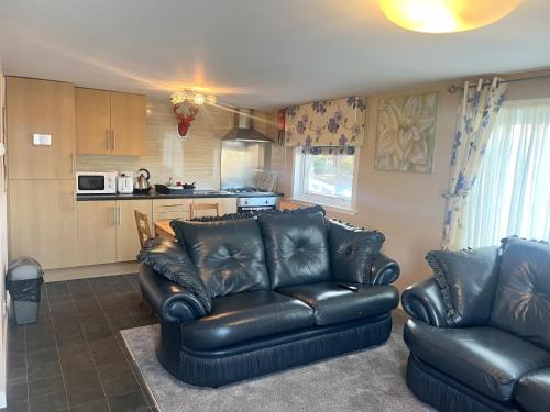 Stepps Resort | Red Deer Village Holiday Park - 3 Bedroom, Self-Catering Chalet