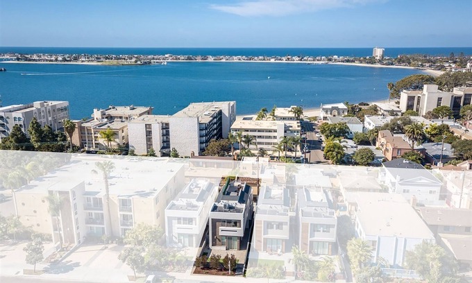 Crown Point House | Relax, recharge and enjoy panoramic sunset views over the bay and ocean in this luxurious home