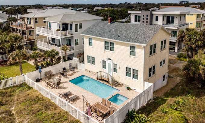 St. Augustine Beach House | Relaxed Cancellation Policy! Oceanfront home with pool,hot tub, fire pit, bikes.