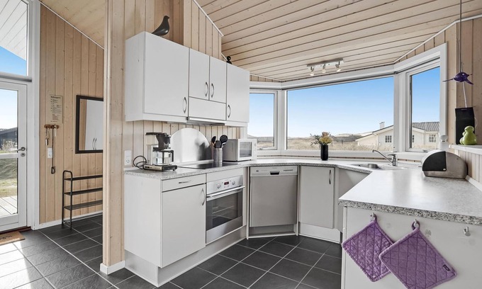 Haurvig House | Relaxed family vacation among the dunes.