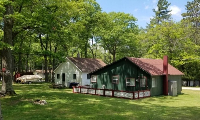 Spruce Cottage | Remodeled cozy cottage & only a 5 minute walk to Hubbard Lake. Lots of parking!