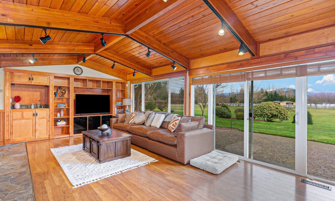 Enumclaw House | Remodeled home with private heated indoor pool, deck, hot tub, fireplace, grill