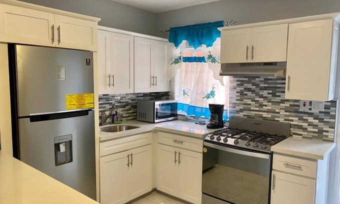 Lucea Apartment | Renovated family-sized home, just a few short minutes from the beach!
