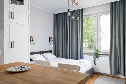 Ochota Apartment | RentPlanet - Studio przy Parku Szczęśliwickim