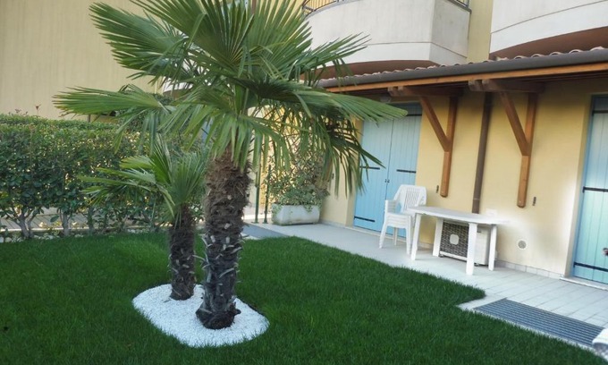 Caorle Apartment | Residence Elisa Piano Terra con Giardino e Posto auto