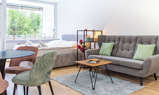 Bodensdorf Apartment | RIOpartment Ossiacher See - Directly on the lake in Bodensdorf, with private bathing area.