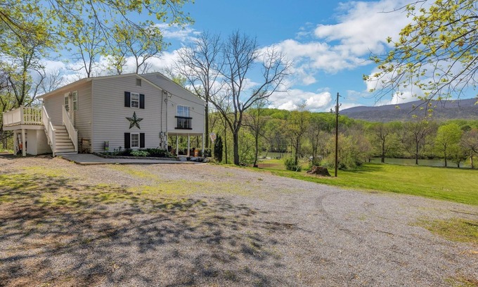 Shenandoah Cottage | Riverside Serenity: A Picturesque Retreat by RedAwning