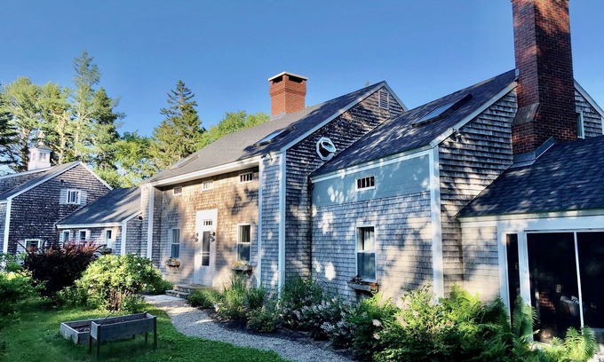 Saint George House | Rocky Bay is a waterfront home with dock, float & beach and sleeps 12.