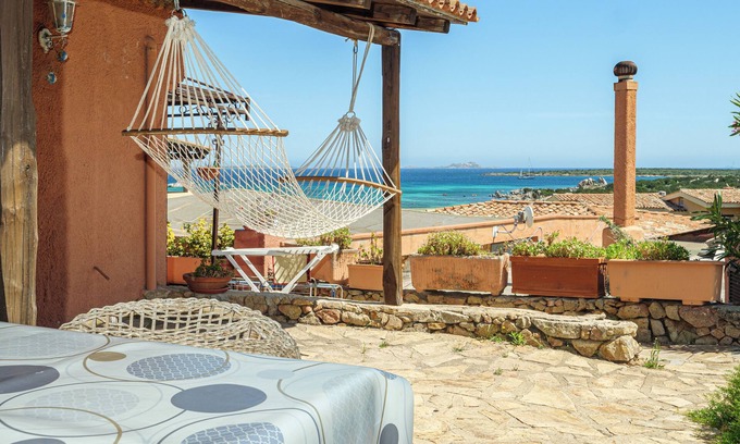 Golfo di Marinella Apartment | Room 'M1 Bouganville Vista Mare' with Sea View, Shared Pool and Private Terrace