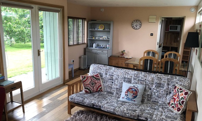 Benson Ski Chalet | Rural self-catering lodge.South-facing sun deck, garden, views over open fields.