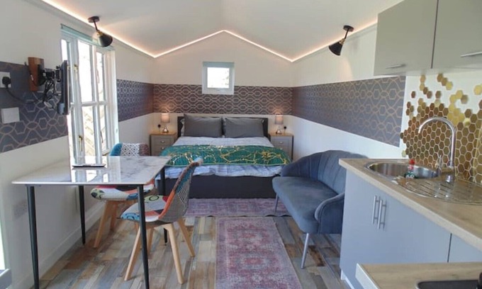 Bury St Edmunds Cabin | Rural Solitary Cabin with deck. In wildflower Meadow. Overlooking nature reserve