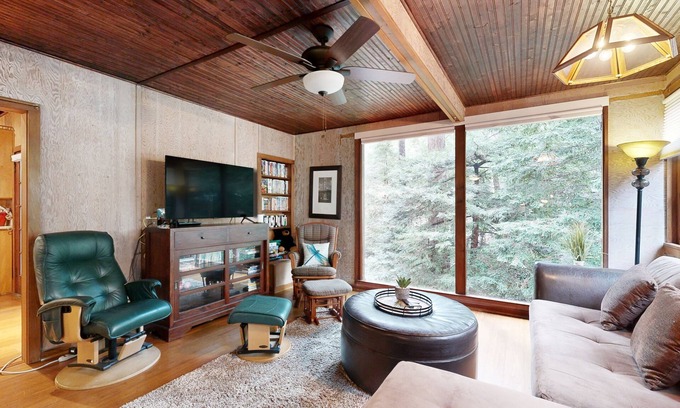 Brookdale Cabin | Rustic chic retreat set back among the trees with furnished deck