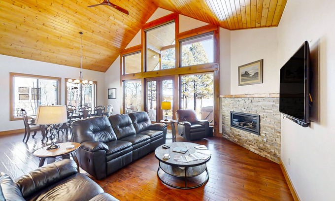 Pagosa Springs House | Rustic lakefront getaway with mountain views - dock, hot tub, fireplace & W/D