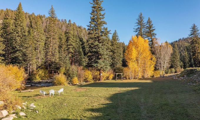 Almont House | Rustic Luxury Meets Nature: Cabins, Fishing & Mountain Adventures