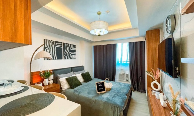 San Fernando Condo | Rustic-Themed Studio with Mt. Arayat View, Instax, Netflix, Karaoke & Boardgames