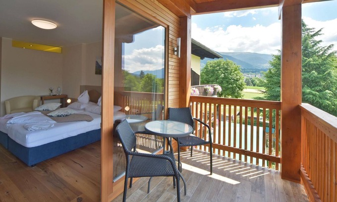 Seeboden Cottage | Süd - See Komfortzimmer Mirnock mit Balkon - Gästehaus Bärwald