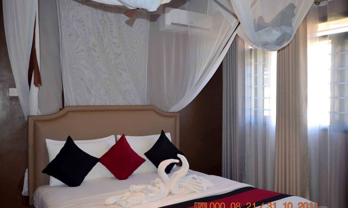 Entebbe Apartment | Saffron Beach Bistro & Cottages - Executive Room 4
