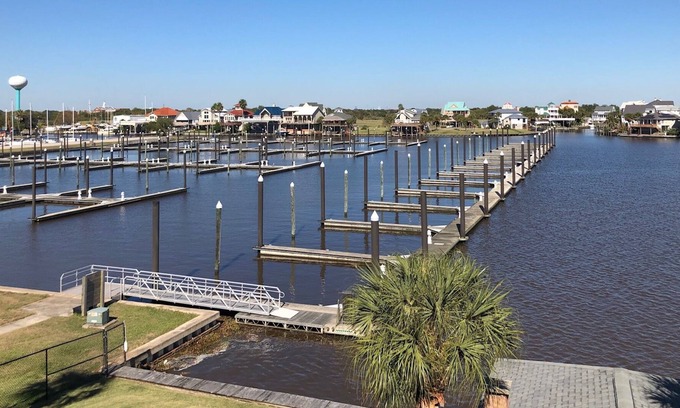Port Arthur Condo | SALT LIFE Waterfront on Sabine Lake With Pool