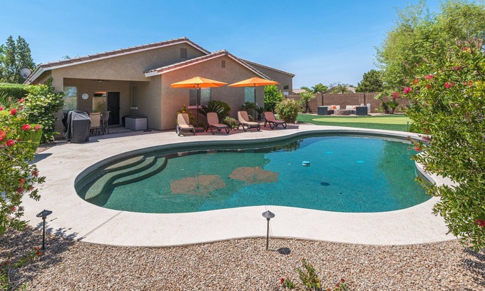 Pecan Creek House | San Tan Valley Backyard Paradise with Heated Pool, Putting Green, and Fire Pit