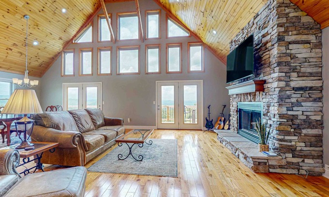 Maynardville House | Scenic lakeview retreat with wraparound deck, vaulted ceilings & game room