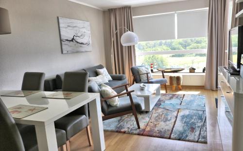 Sahlenburg Apartment | Schicke FeWo 150m vom Strand kostenlos WLAN großes Schwimmbad Sauna