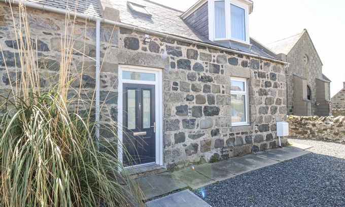 St Combs Cottage | SEA BREEZE ST COMBS, pet friendly, with a garden in St Combs