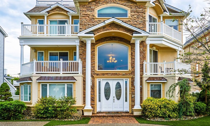 A-Zone House | Seaside Beach Mansion w/9 Bedrooms, 8 Full Baths, Pool, Elevator & Rooftop Deck.