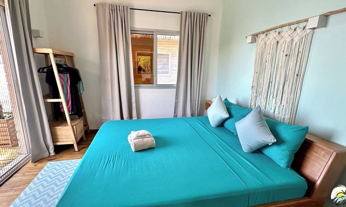 Isla Solarte House | Seaside Dream Over Water Bungalow, Bedroom, King Bed, Living Room, Kitchenette