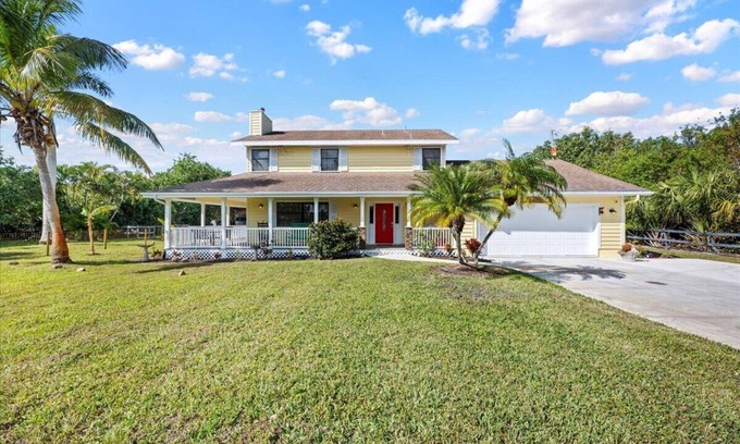White City House | Secluded 2.5 Acre Farmhouse with Wrap-Around Porch