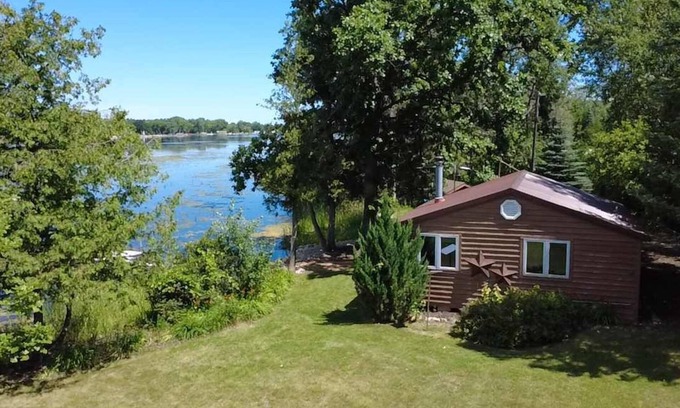 Little Sturgeon Cabin | Secluded Waterfront Cottage with Kayaks and Fire Pit