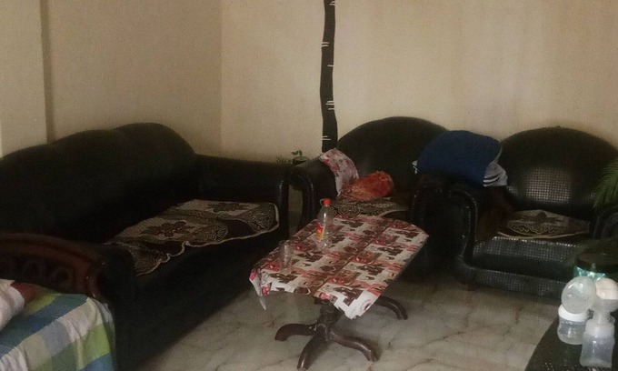 Mehrauli House | semi furnished Flat For Rent with one queen size bed and 4 chairs dining table