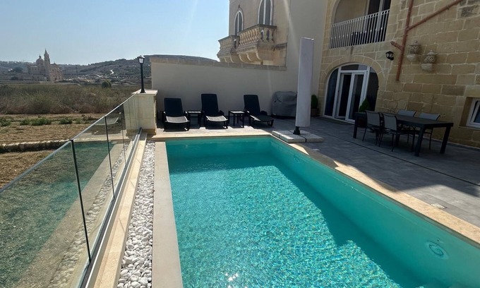 Gharb Other | Serena Farmhouse is a Rustic and spacious 5-bedroom with pool and jacuzzi.