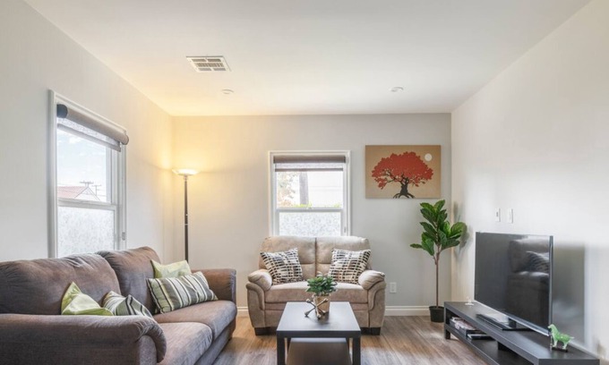 East San Gabriel House | Serene Gem in LA: 4 Bedrooms with a Walk-In Closet, Streaming Options, High-Speed Internet, and Front Yard Oasis.