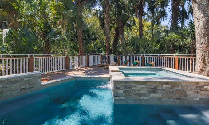 West Beach House | Short Stroll to Beach! Exquisitely Renovated Home w/Pool & Hot Tub, Spacious Deck & Lagoon Views!
