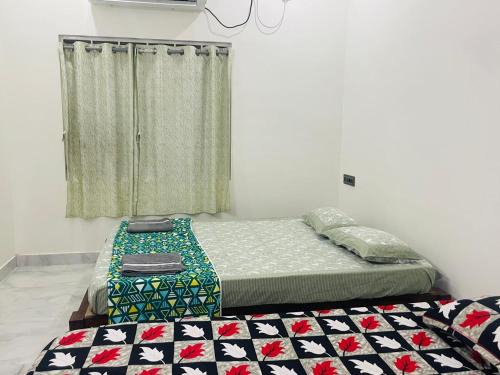Gokarna House | Shri Virajita - Budget AC twin bed- room