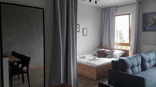 Wilanow Apartment | Silver Apartment in Wilanów